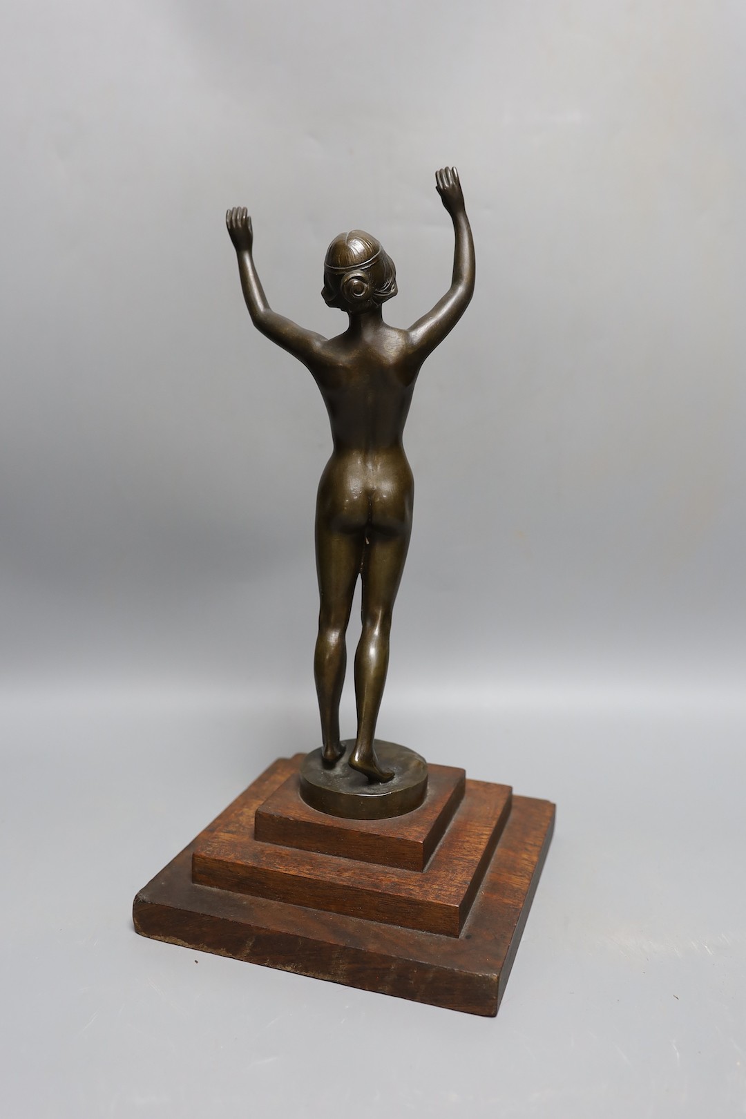 An Art Deco style bronze model of a nude female. 36cm